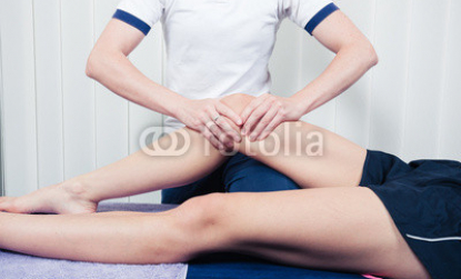 Physiotherapist_treating_knee.jpg